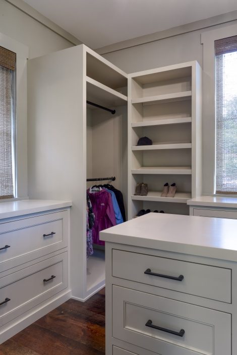 CUSTOM BUILT IN WHITE CLOSET CABINETRY